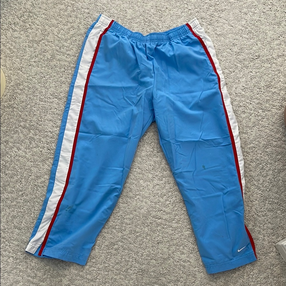 Nike Blue Track Pants with Red and White Stripes